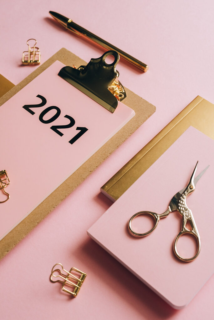 pink 2021 calendar with other desk accessories